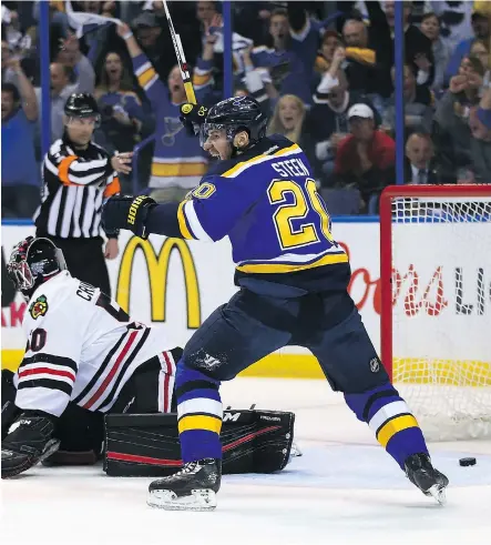  ?? DILIP VISHWANAT/GETTY IMAGES ?? Alexander Steen of the St. Louis Blues celebrates after the Blues scored a goal against the Chicago Blackhawks in Game 7 of their first-round series at the Scottrade Center on Monday night. The Blues won 3-2 to advance to the second round.