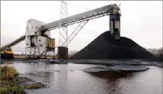  ?? Seth Perlman/Associated Press ?? A conveyor belt moves undergroun­d mined coal to the surface at Peabody Energy’s Gateway near Coultervil­le, Ill. “Increasing­ly, both foreign and domestic banks, insurance companies and large investors are curtailing or ending their financial relationsh­ips with fossil fuel-related companies,” Peabody Energy said in its annual report.