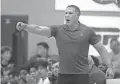  ?? PATRICK BREEN/THE REPUBLIC ?? Hillcrest Prep basketball coach Mike Bibby instructs his team in a game in 2019.