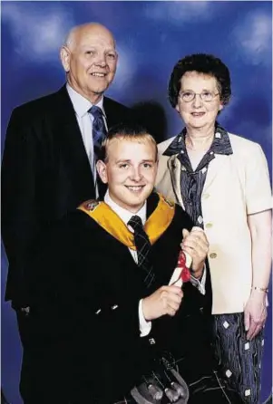  ??  ?? FAMILY UNIT: Sandy Ingram, with wife Ann and son Andrew at his graduation