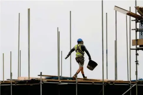  ?? (PA) ?? The building sector suffered its worst month since May 2020