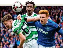  ??  ?? LEARNING CURVE: Bates battles with Kieran Tierney and Dedryck Boyata during last week’s Scottish Cup defeat at Hampden as Rangers failed to lay a glove on Celtic