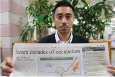  ??  ?? Eima Kishimoto, porte-parole du maire de Nago, dénonce l'occupation américaine.