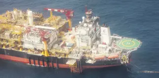  ??  ?? The Kaombo Norte, an oil tanker converted into a FPSO vessel, owned by the French Total oil company, about 250km off the coast of Angola in the Atlantic Ocean, on Nov. 8.