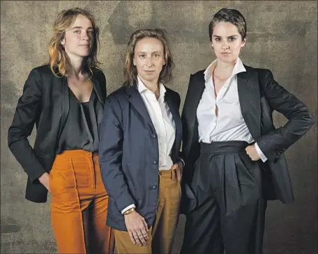  ?? Jay L. Clendenin Los Angeles Times ?? WRITER-DIRECTOR Céline Sciamma is flanked by costars Adèle Haenel, left, and Noémie Merlant at Toronto film fest last September.