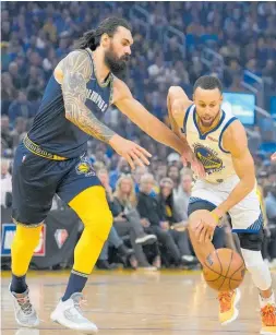  ?? Photo / AP ?? Steven Adams keeps an eye on Warriors guard Steph Curry during the first half of Game 4 on Tuesday.