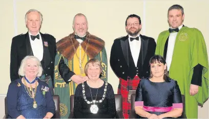  ??  ?? Top table guests Pictured (back row, left) are Lord Lieutenant Alan Simpson, Dean of The Guildry of Stirling Alasdair Gammack, Dr Murray Cook, Guildry Officer Jim Mailer and (front, left) Elizabeth Roads, who gave the vote of thanks, Provost Simpson and Ailsa Stanwix