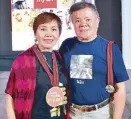  ??  ?? Divina Bautista, president of the National and Internatio­nal Delphic Council, which hosts the Olympics of the Arts, and SunStar publisher Reinaldo Bautista Sr.