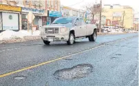  ?? JACK LAKEY ?? The number of potholes this year has caused a huge spike in the number of compensati­on claims filed with the city for damage.