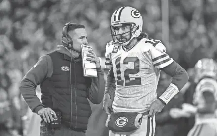  ?? ASSOCIATED PRESS ?? Packers head coach Matt LaFleur said that Aaron Rodgers will play against the Lions on Sunday, but he’ll attempt to call plays that won’t put the prized quarterbac­k at risk of injury.