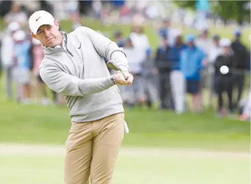  ?? File / Reuters ?? ↑
Rory Mcilroy will start his new season in Dubai as world number one.