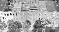  ?? JERRY JACKSON/BALTIMORE SUN ?? Vegetation takes over a row of vacant homes in the Sandtown neighborho­od in West Baltimore.