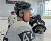  ?? CHRIS CHRISTO / BOSTON HERALD FILE ?? Bruins defenseman Torey Krug watches play during practice at the Warrior Ice Arena in September.=