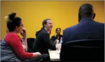  ?? THE ASSOCIATED PRESS ?? Facebook CEO Mark Zuckerberg laughs as he meets with a group of entreprene­urs and innovators during a roundtable discussion at Cortex Innovation Community technology hub Thursday in St. Louis.