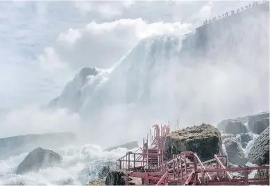  ??  ?? Builders install a deck at the popular Cave of the Winds attraction at Niagara Falls State Park in New York last May. A new marketing effort launched this week rebrands the American shore of the falls as a natural playground to be explored on foot, bike, boat or helicopter.