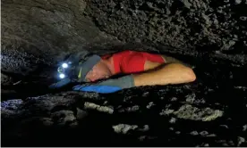  ?? ?? Extreme caving in Washington state: not for the faintheart­ed. Photograph: Ahrlin