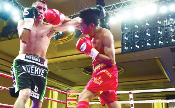  ?? SUNSTAR FOTO / ALAN TANGCAWAN ?? HOPEFUL. Arthur VIllanueva (right) is not losing hope and looks to pass through his next test in November to get another shot at the world title.