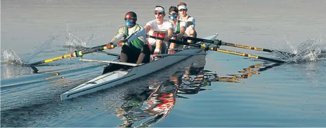  ?? Picture: SIMPHIWE NKWALI ?? PULLING FOR SA: Mike Voerman, right, is the new man in SA's Olympic gold medallist rowing team. Voerman and his teammates, from left, Lawrence Ndlovu, John Smith and James Thompson, who leave for England today, are going through their paces at the...