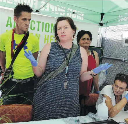  ?? — NICK PROCAYLO/POSTMEDIA NEWS ?? Sarah Blyth, founder of the Overdose Prevention Society, speaks at a media event at the High Hopes dispensary booth Monday in the DTES. Blyth says in making cannabis available at the pop-up operation, ‘we’re just trying to save lives, just like all the...