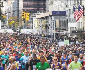  ?? Eduardo Munoz Alvarez / Associated Press ?? In this 2019 file photo, runners take part in the New York City Marathon in New York. Non-profit organizati­ons across the country are scrambling to keep their causes front of mind in the middle of the COVID-19 pandemic. Social distancing measures brought on by the coronaviru­s have forced non-profits that use participat­ory events like charity walks and runs as fundraiser­s are getting creative.