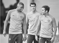  ??  ?? (From left) Chelsea’s French midfielder­Tiemoue Bakayoko, Chelsea’s Spanish striker Alvaro Morata and Chelsea’s Spanish midfielder Cesc Fabregas attend a team training session at Chelsea’s Cobham training facility in Stoke D’Abernon, southwest of London...