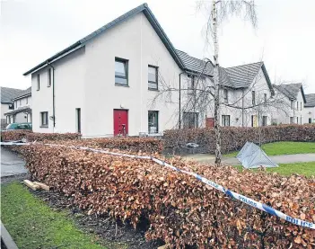  ?? Pictures: Kris Miller. ?? The body of Douglas Anderson, below right, was found in Dunnock Park. The area was cordoned off yesterday as police carried out doorto-door inquiries.