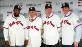  ?? FRANK FRANKLIN II — THE ASSOCIATED PRESS ?? In this Jan. 25, 2018, file photo, Baseball Hall of Fame inductees, from left, Vladimir Guerrero, Trevor Hoffman, Chipper Jones and Jim Thome, pose during a news conference in New York. Induction ceremonies will be Sunday, July 29, 2018.