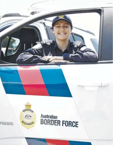  ??  ?? VARIETY: Recently graduated Australian Border Force recruit Louise Officer on duty at Cairns Airport Internatio­nal Terminal.