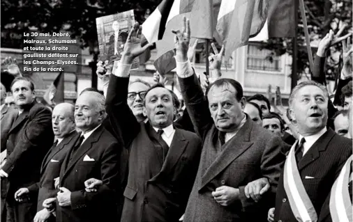  ??  ?? Le 30 mai, Debré, Malraux, Schumann et toute la droite gaulliste défilent sur les Champs-Elysées. Fin de la récré.