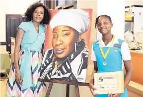  ??  ?? Rosemary Duncan (left), manager at the Rita Marley Foundation, and Nastacia Linton, first-place winner of last year’s essay competitio­n.