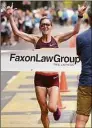  ?? Arnold Gold / Hearst CT Media ?? Keira D’Amato of Virginia finishes first for the women in the Faxon Law New Haven Road Race 20K on Monday.