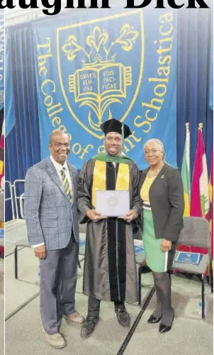  ?? ?? Duvaughn Dick is flanked by his father, Reverend Dr Devon Dick, and mother Mary Dick at his graduation ceremony at College of St Scholastic­a in Minnesota, United States.