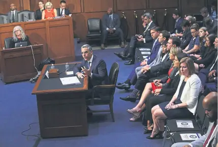  ?? Alex Wong, Getty Images ?? David Marcus, the head of Facebook’s digital currency project, testifies before the Senate Banking, Housing and Urban Affairs Committee during a hearing in Washington on Tuesday. The committee conducted the hearing on “Examining Facebook’s Proposed Digital Currency and Data Privacy Considerat­ions.” Marcus told the committee: “We know we need to take the time to get this right.” Said the committee’s senior Democrat, Ohio Sen. Sherrod Brown: “Facebook is dangerous.”