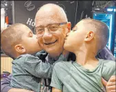  ?? Rinat Har ?? Hostage Luis Har, 70, with two of his grandchild­ren in Israel.