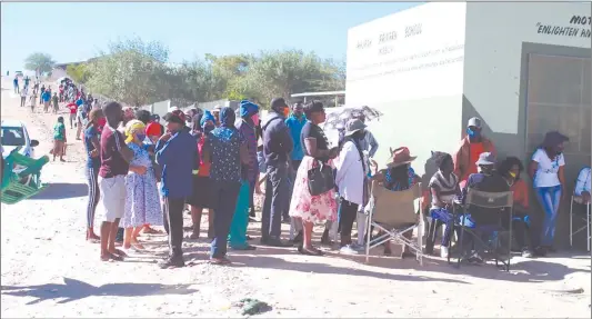  ?? Photo: Emmency Nuukala ?? Kingmakers… Voters line up to cast their ballots in the regional council and local authority elections.