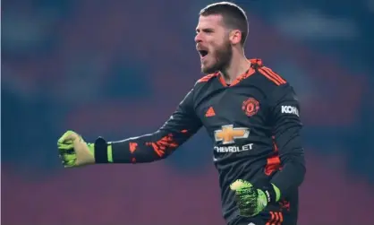  ??  ?? David de Gea celebrates after Marcus Rashford scores the winning goal for Manchester United against Wolves on Tuesday. Photograph: Laurence Griffiths/EPA