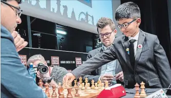  ?? FAMILY OF SHREYAS ROYAL NYT ?? Shreyas Royal, right, has been called Britain’s greatest chess prospect in a generation.