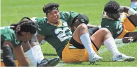  ?? MARK HOFFMAN / MILWAUKEE JOURNAL SENTINEL ?? Top draft pick Jaire Alexander (center) is being counted on to play a big role in Green Bay’s young secondary.
