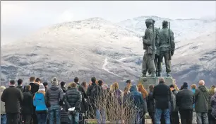  ?? Photograph: Iain Ferguson, the Write Image. ?? Snow on the hills above the Commando Memorial provided a stunning backdrop to the service.