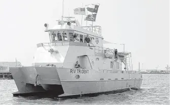  ?? James Nielsen / Houston Chronicle ?? Texas A&M University at Galveston has a new $2.5 million research vessel, the R/V Trident. The vessel will take core samples along the Gulf and can handle different types of scientific gear.