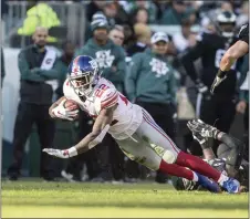  ?? JOHN BLAINE — FOR THE TRENTONIAN ?? Giants running back Wayne Gallman Jr. (22) will get the start in place of the injured Saquon Barkley.