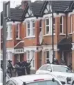  ?? Police raid the London house. ??