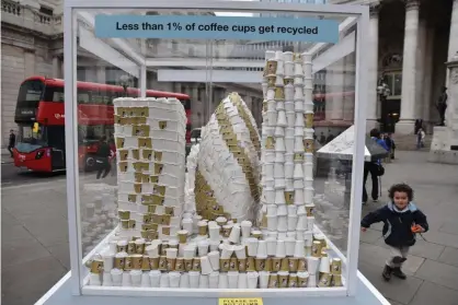  ??  ?? A model of London made out of coffee cups highlights the need to reduce waste. Photograph: Matthew Chattle/Alamy