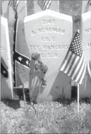  ?? Associated Press ?? The grave site of Augustus Beckmann is photograph­ed on May 30 at Camp Chase Confederat­e Cemetery, in Columbus, Ohio, on Memorial Day weekend.