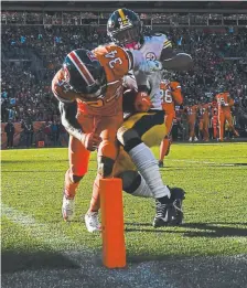  ?? AAron Ontiveroz, The Denver Post ?? Broncos safety Will Parks forces a fumble and a turnover at the 1-yard line against Pittsburgh Steelers tight end Xavier Grimble during the second quarter.