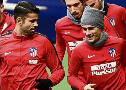  ??  ?? New firepower: Diego Simone is hoping Diego Costa (left) and Antoine Griezmann will form a lethal partnershi­p as his players train at the Wanda Metropolit­ano Stadium in Madrid. — AFP