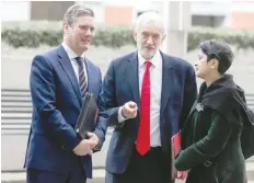  ?? — AFP ?? Jeremy Corbyn (C) arrives at the EU Commission in Brussels on Thursday ahead of a meeting with EU Brexit negotiator.