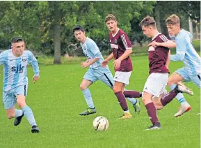  ??  ?? Fairmuir Park was the venue as East Craigie Swifts beat North End (maroon) in the U/19 Scottish Cup.