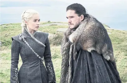  ?? HELEN SLOAN HBO ?? Emilia Clarke and Kit Harington in HBO’s Game of Thrones, up against stiff Emmy competitio­n this year.