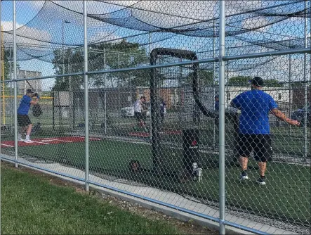  ?? ADAM SCHABEL — THE MORNING JOURNAL ?? Midview head coach Ryan Morgan pitches to senior Bryce Sanders June 11.